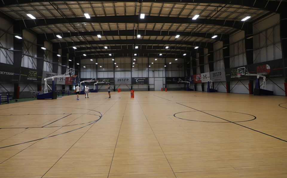 Spacious gymnasium with basketball hoops